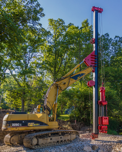 Timber pile contractor using drop hammer installation method